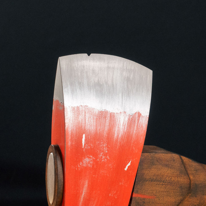 A TF2 Pyro Fire Axe cosplay prop with a Metal paint job