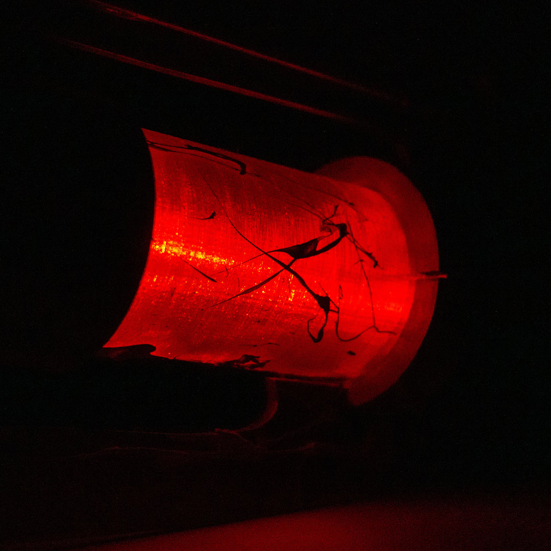 A TF2 Medic Übersaw either bloodied or not! Has a central glowing tube and can be Festivized!