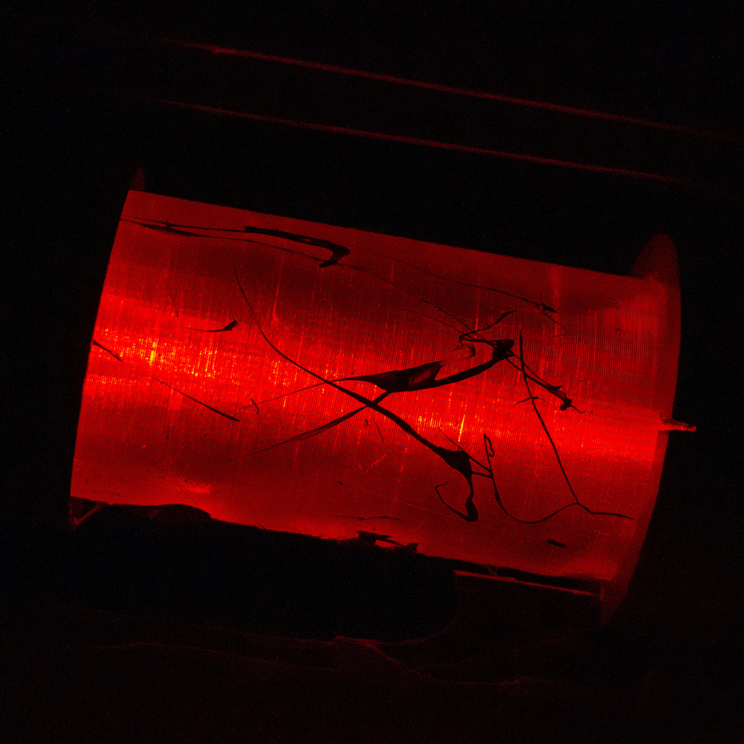 A TF2 Medic Übersaw either bloodied or not! Has a central glowing tube and can be Festivized!