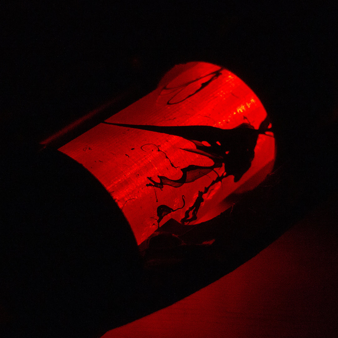 A TF2 Medic Übersaw either bloodied or not! Has a central glowing tube and can be Festivized!