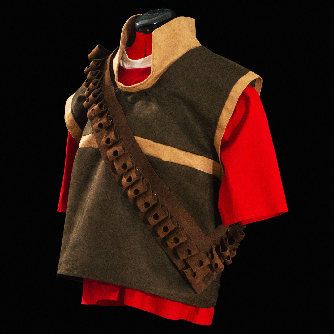 A suede tf2 heavy vest made for Meet The Real Medic with its leather bandolier and red shirt ready for cosplays