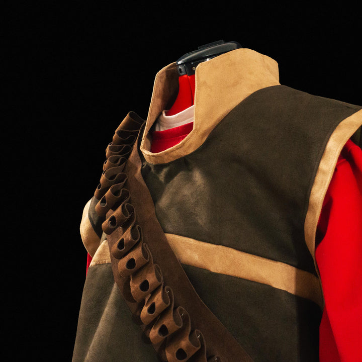 A suede tf2 heavy vest made for Meet The Real Medic with its leather bandolier and red shirt ready for cosplays