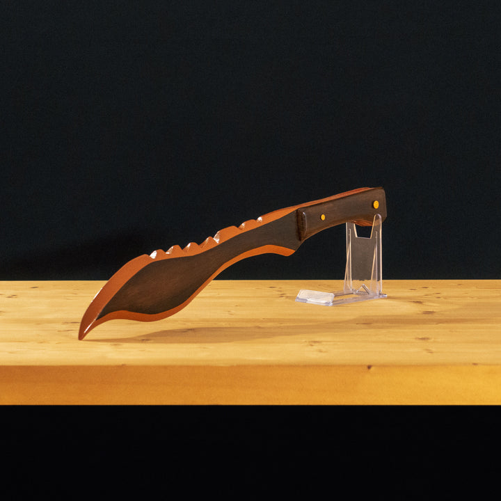 A TF2 Sniper Wooden kukri cosplay prop! Finished with glossy clear coat like in-game!