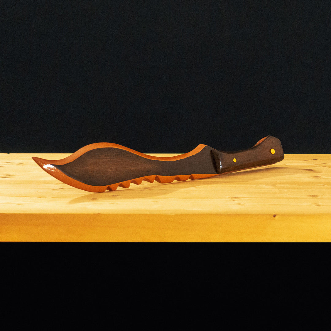 A TF2 Sniper Wooden kukri cosplay prop! Finished with glossy clear coat like in-game!