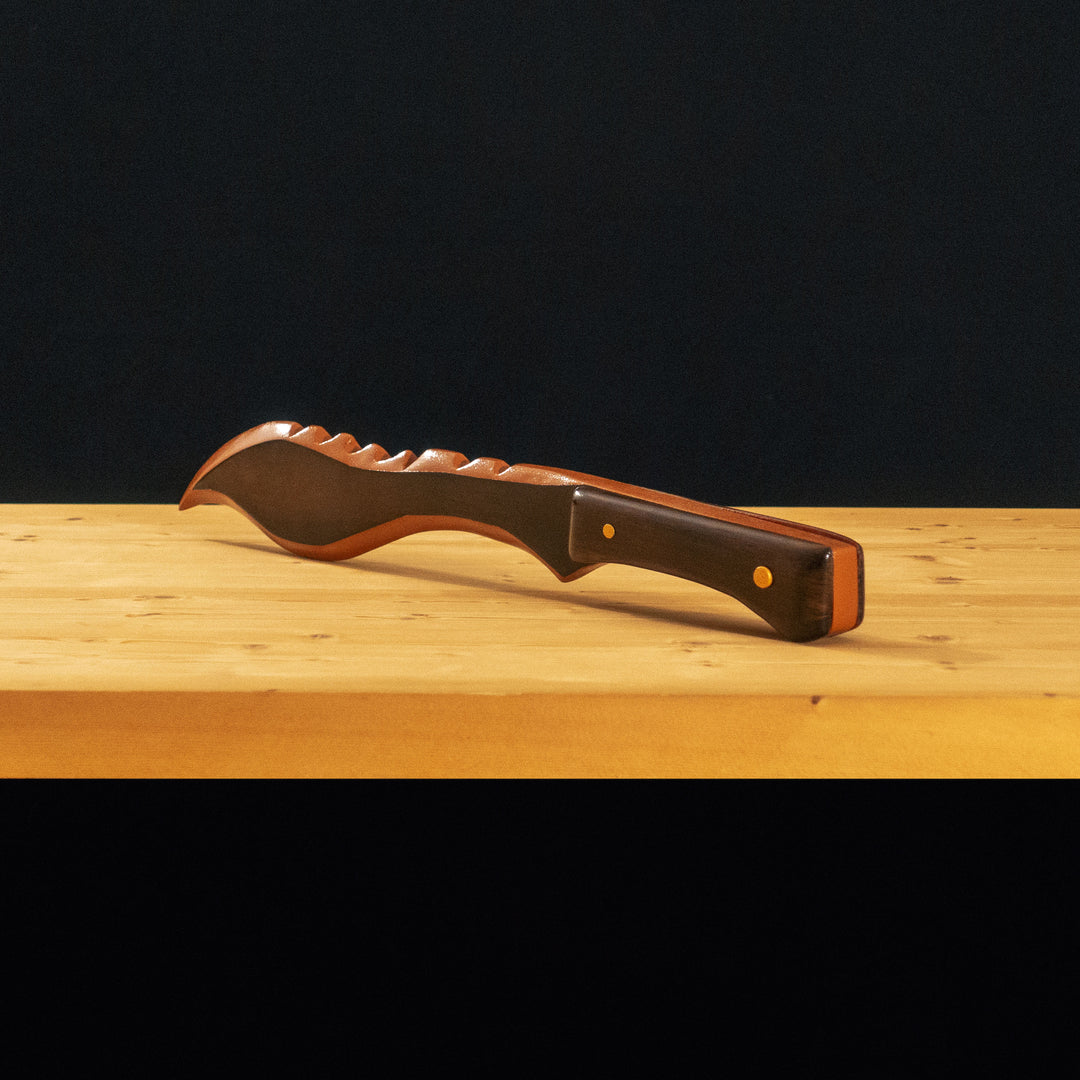 A TF2 Sniper Wooden kukri cosplay prop! Finished with glossy clear coat like in-game!