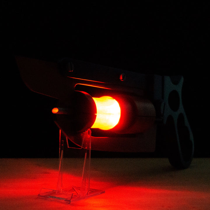 A TF2 Medic Übersaw either bloodied or not! Has a central glowing tube and can be Festivized!