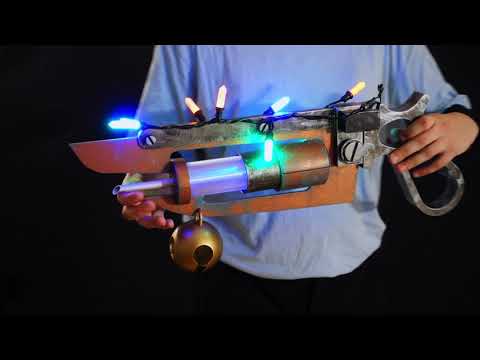 A TF2 Medic Übersaw prop with a metal paint job. Comes in Festive and with out without blood effects!