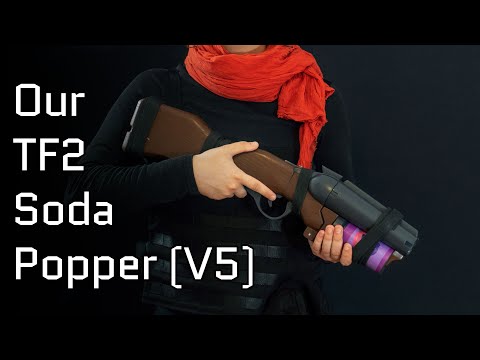 A TF2 Scout Soda Popper with moving parts, fake cartridges that slot in and wooden element! 