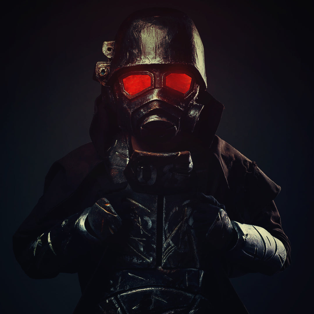 A Fallout New Vegas inspired full NCR Ranger cosplay featuring its main recognisable features: the Embroidered Duster Coat, the Chest Armour, Helmet with glowing lenses, Forearm plates, Gloves with another small steel cutout AND the Air tanks backpack being optional. All armour pieces but the helmet are done with High Density EVA Foam. 
