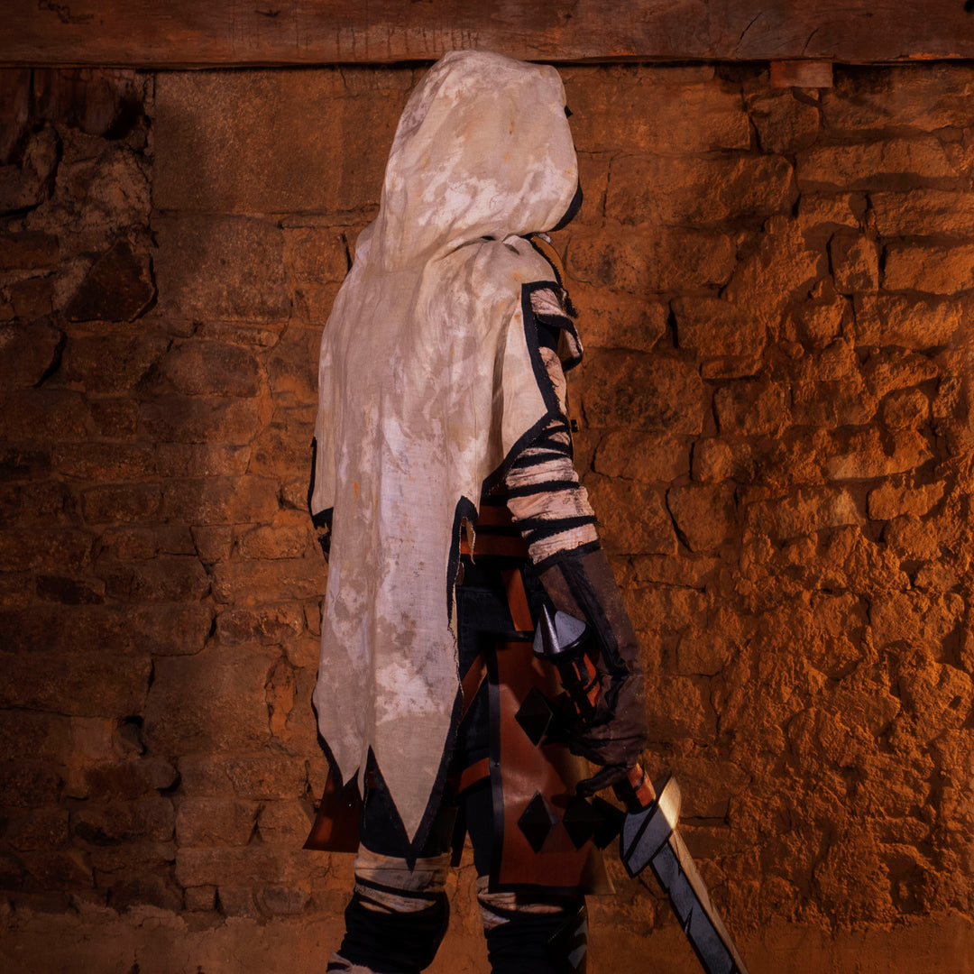 A full Leper cosplay bundle from Darkest Dungeon! Includes the Chest Armour, Wadders, Knee pads, Bandages, Cloak and Sword all with the cell-shadded look!