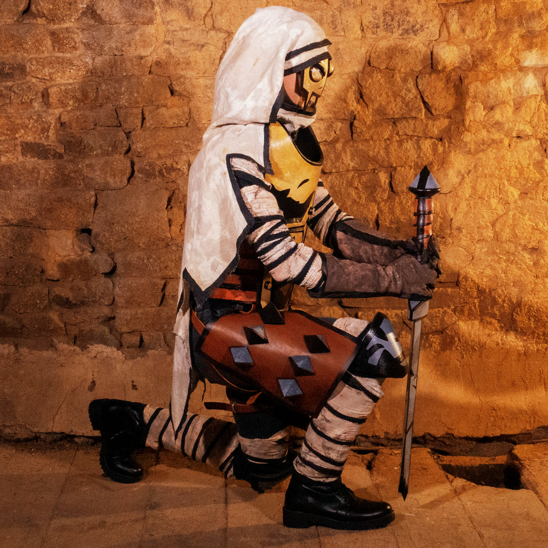 A full Leper cosplay bundle from Darkest Dungeon! Includes the Chest Armour, Wadders, Knee pads, Bandages, Cloak and Sword all with the cell-shadded look!