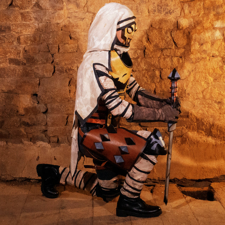 A full Leper cosplay bundle from Darkest Dungeon! Includes the Chest Armour, Wadders, Knee pads, Bandages, Cloak and Sword all with the cell-shadded look!