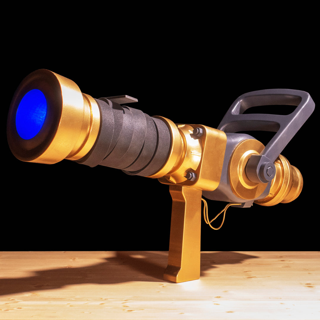 A TF2 Medic Australium Medigun prop for cosplay or collection with a glowing barrel!