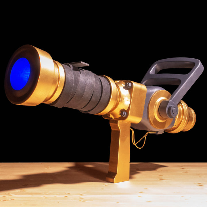 A TF2 Medic Australium Medigun prop for cosplay or collection with a glowing barrel!