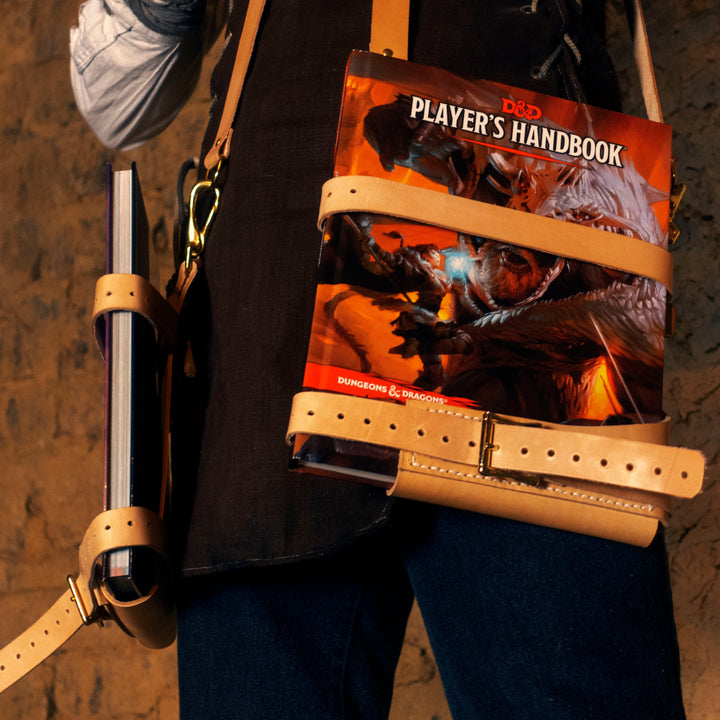 Caleb Widogast Leather Spellbook Holsters Critical Role's Campaign 2, great for cosplay or frolicking with your sketchbook! Comes in any colour you want. Vegetable leather and hand sewn.