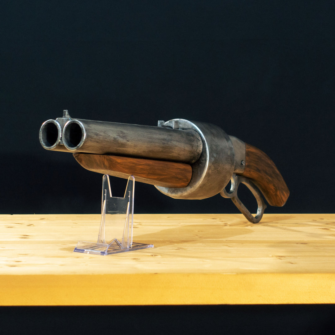 A TF2 Scout Scattergun cosplay prop with a metal paint job. Comes in Festive too!