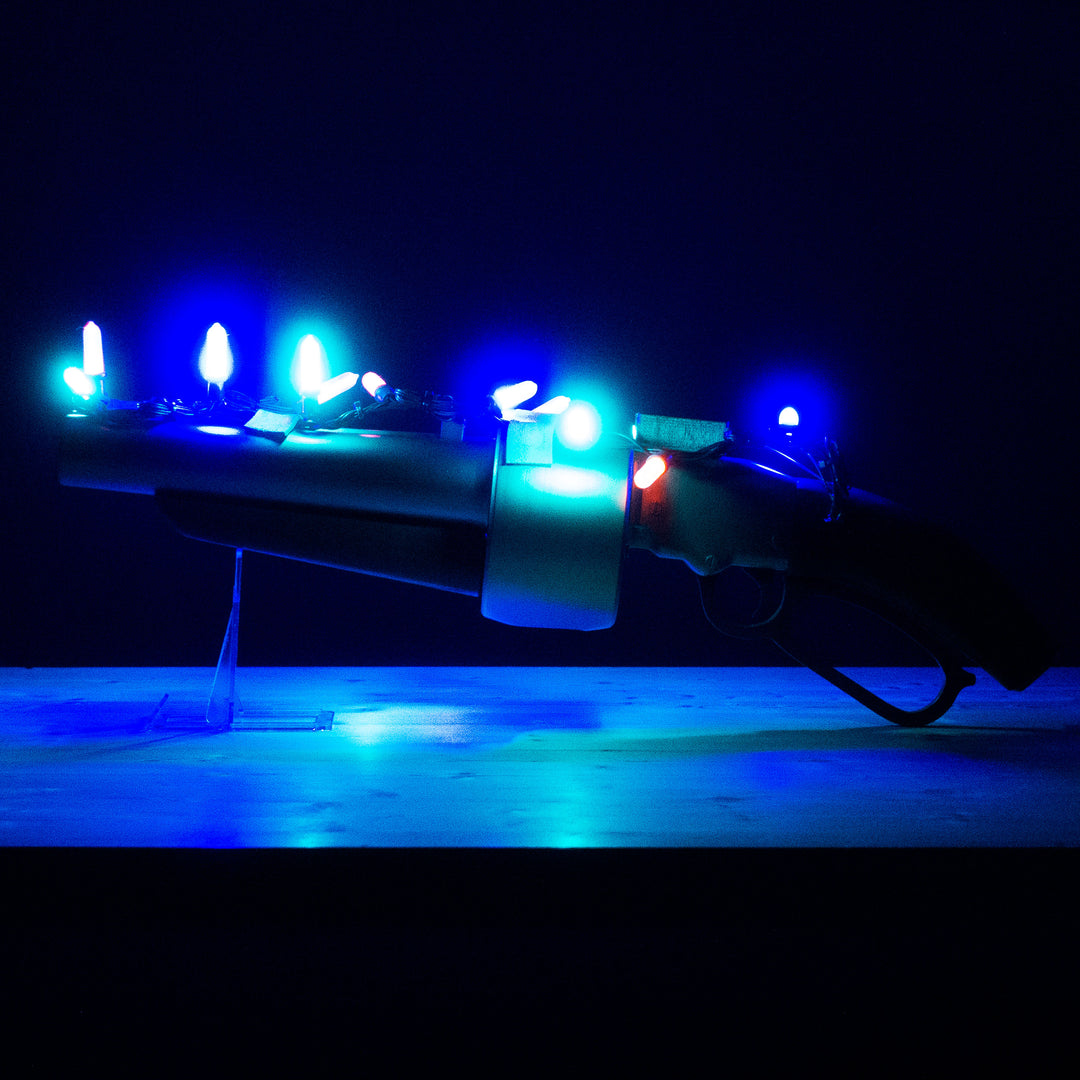 A TF2 Scout Australium Scattergun cosplay prop. Comes in Festive too!