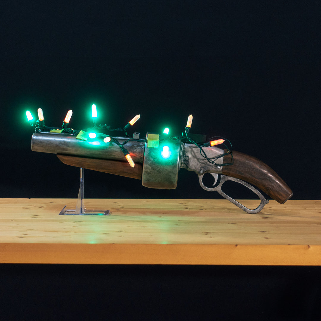 A TF2 Scout Scattergun cosplay prop with a metal paint job. Comes in Festive too!