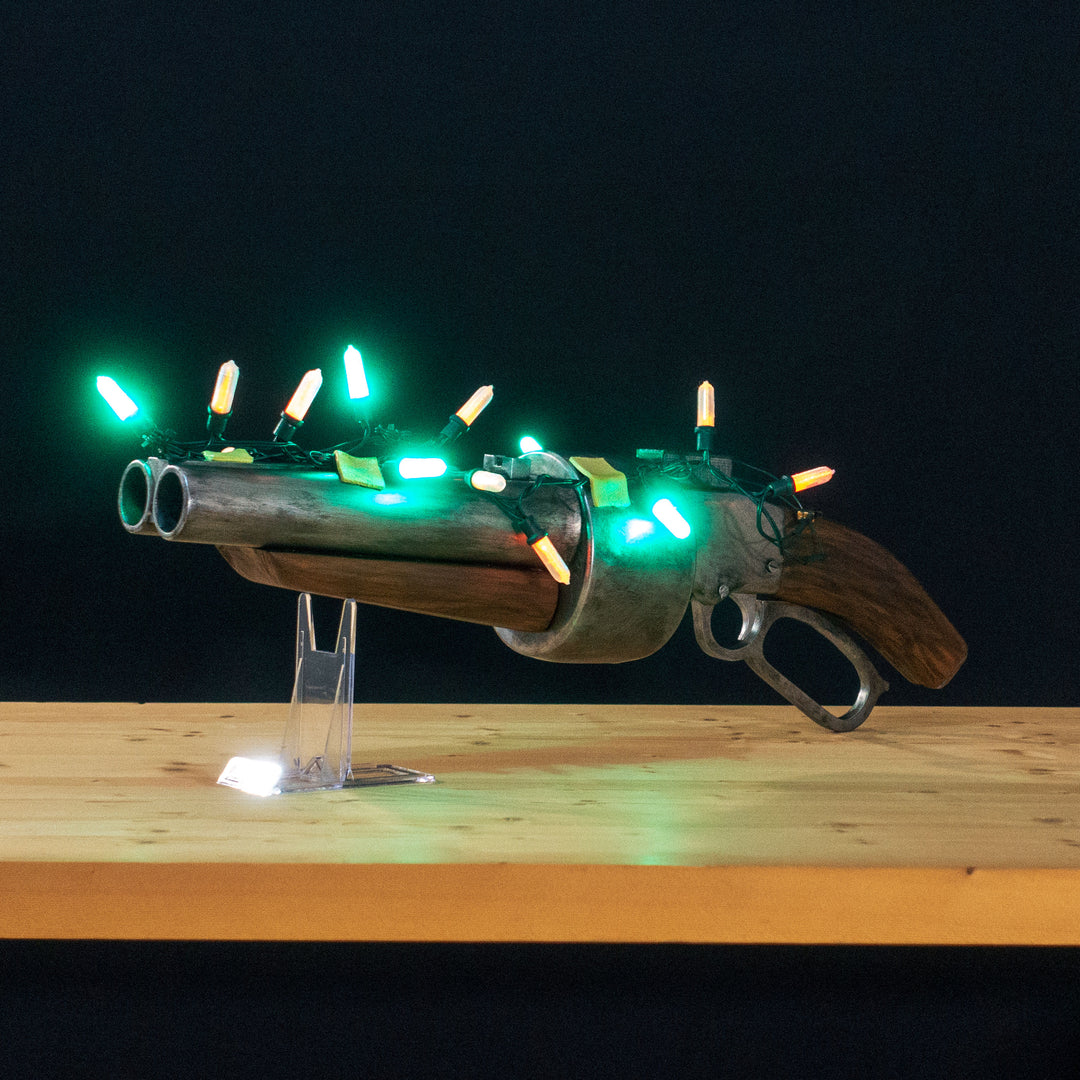 A TF2 Scout Scattergun cosplay prop with a metal paint job. Comes in Festive too!