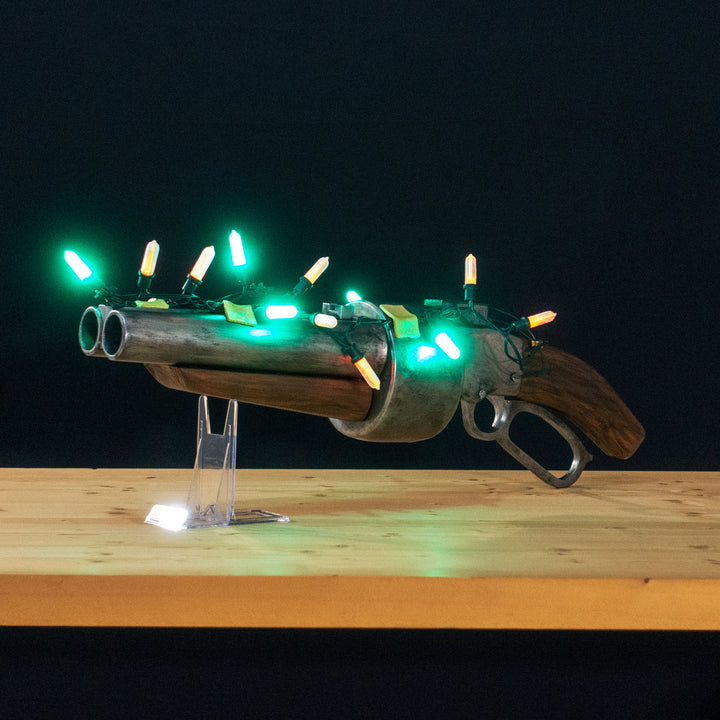 A TF2 Scout Scattergun cosplay prop with a metal paint job. Comes in Festive too!