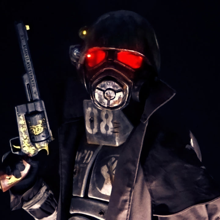 A Fallout New Vegas inspired full NCR Ranger cosplay featuring its main recognisable features: the Embroidered Duster Coat, the Chest Armour, Helmet with glowing lenses, Forearm plates, Gloves with another small steel cutout AND the Air tanks backpack being optional. All armour pieces but the helmet are done with High Density EVA Foam. 