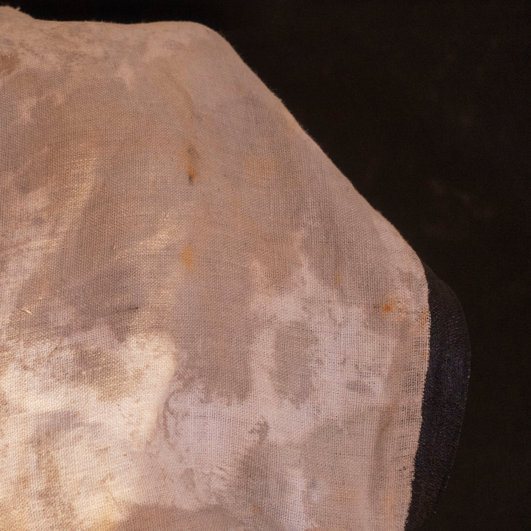 A Leper Cloak from Darkest Dungeon made demi-natte cotton canvas. Comes with the whole desaturated and cell shaded look!