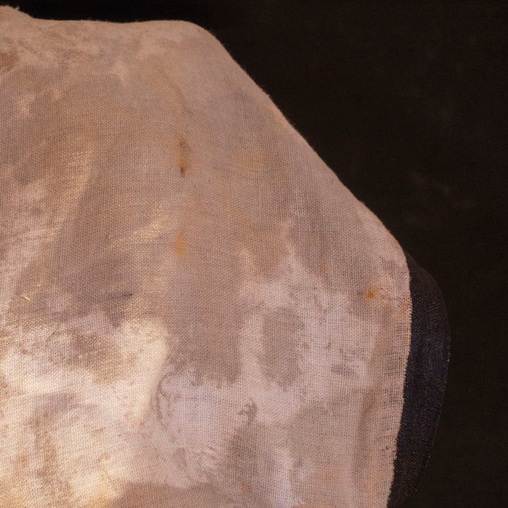 A Leper Cloak from Darkest Dungeon made demi-natte cotton canvas. Comes with the whole desaturated and cell shaded look!