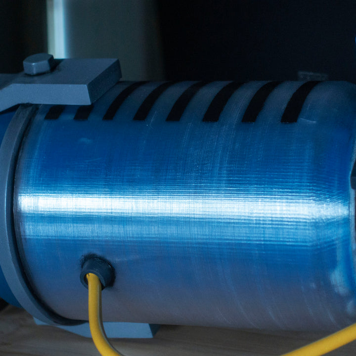 A TF2 Medic Qui-Fix cosplay prop that has two light function for its glowing barrel that is feature in Meet the Real Medic.