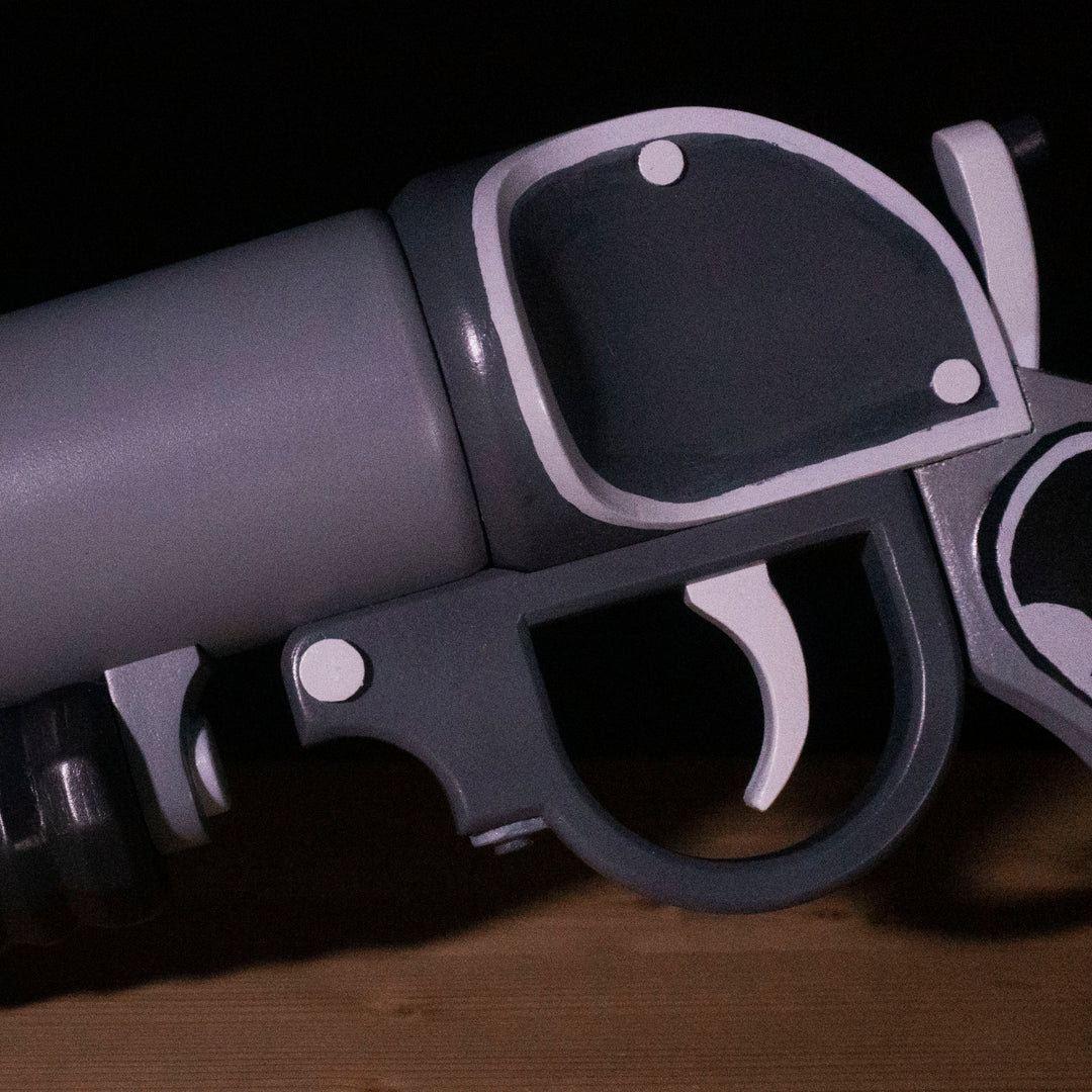 A TF2 Pyro Scorch Shot cosplay prop with its Team Fortress 2 paint job!