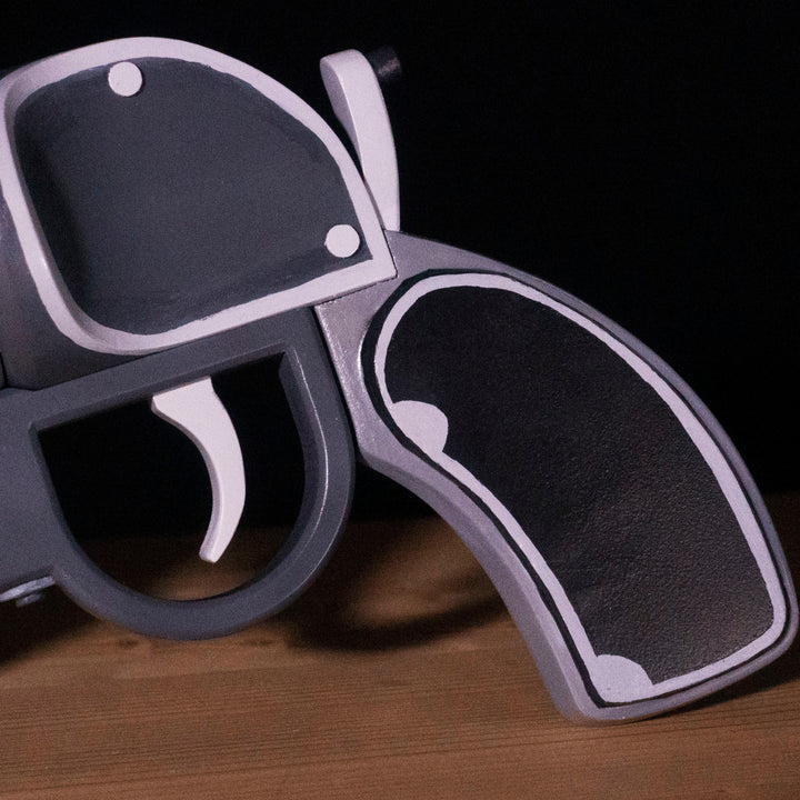 A TF2 Pyro Scorch Shot cosplay prop with its Team Fortress 2 paint job!