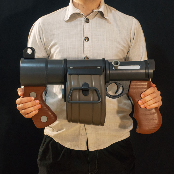 A TF2 Demoman Sticky Launcher cosplay prop with moving parts, wooden elements and a sticky!