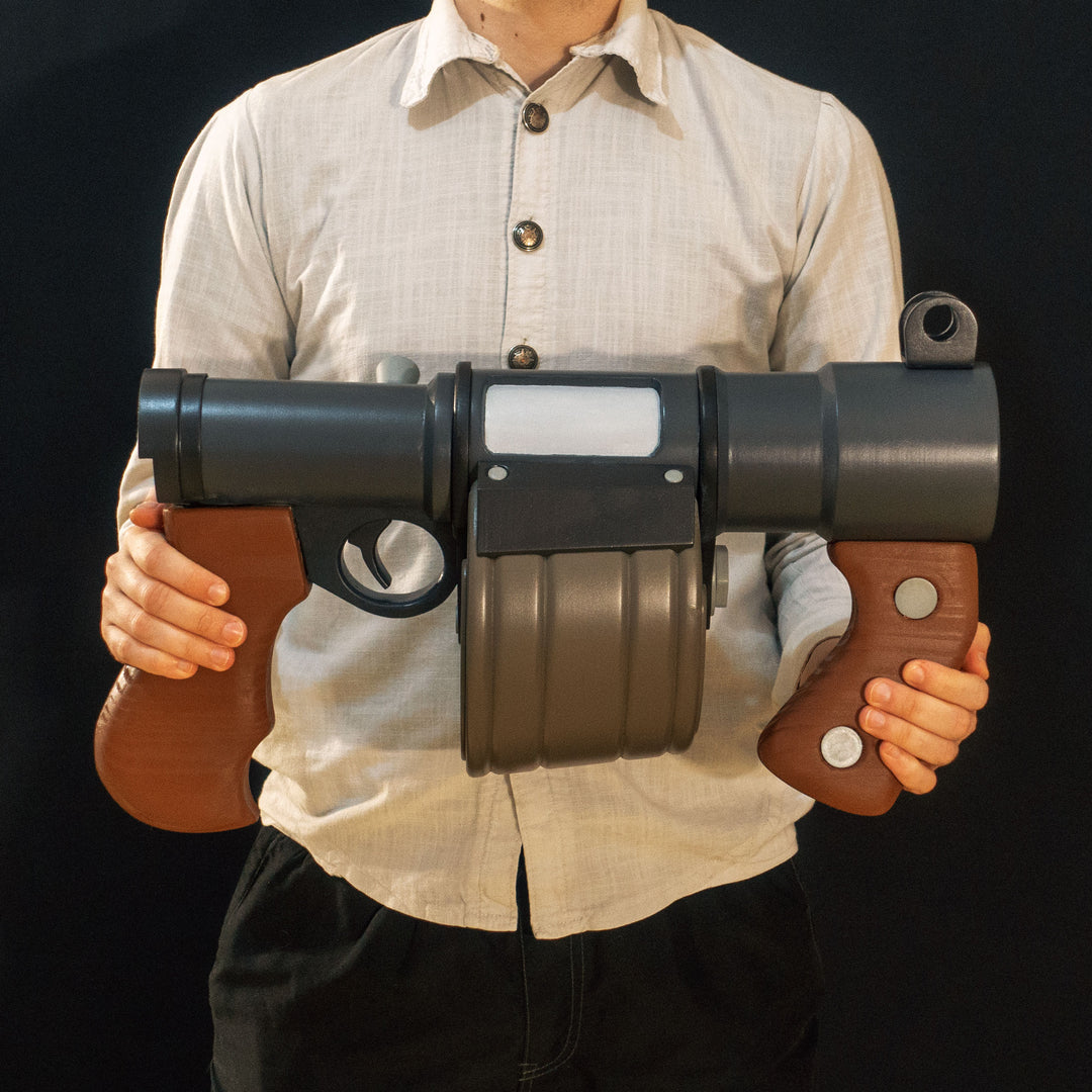 A TF2 Demoman Sticky Launcher cosplay prop with moving parts, wooden elements and a sticky!
