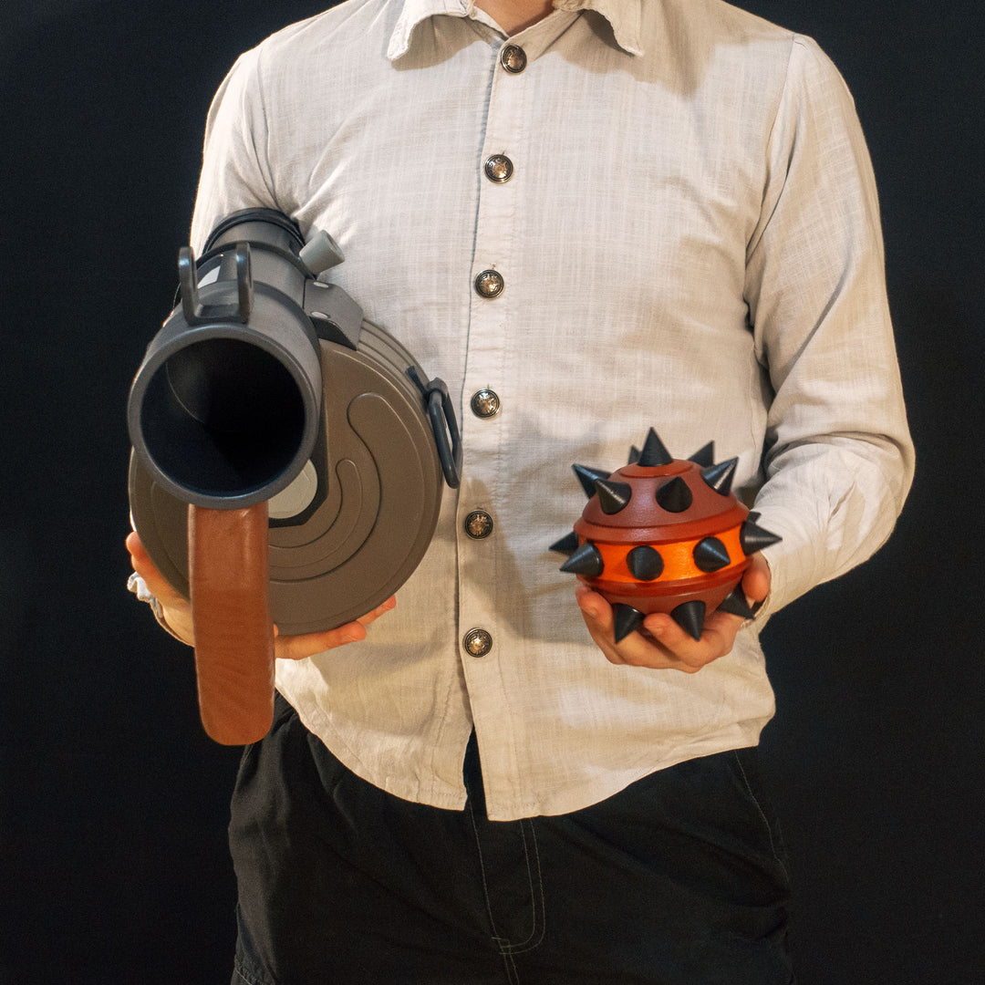 A TF2 Demoman Sticky Launcher cosplay prop with moving parts, wooden elements and a sticky!