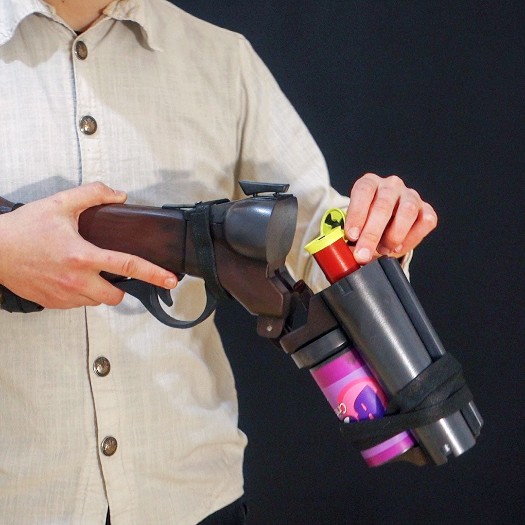 A TF2 Scout Soda Popper with moving parts, fake cartridges that slot in and wooden element! 